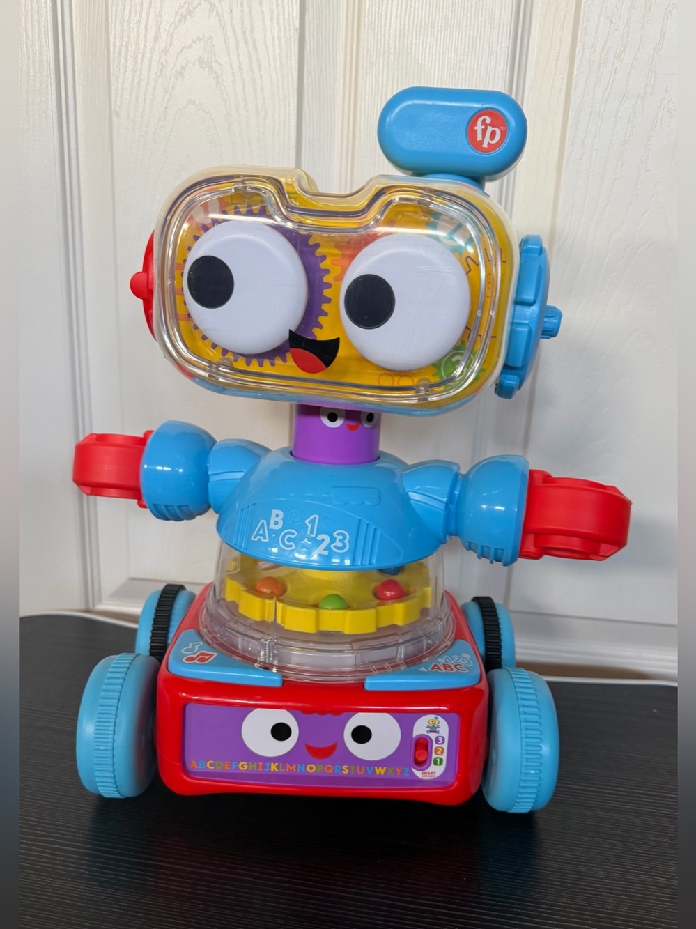 Fisher-Price 4-in-1 Robot Baby to Preschool Learning Toy with Lights & Music